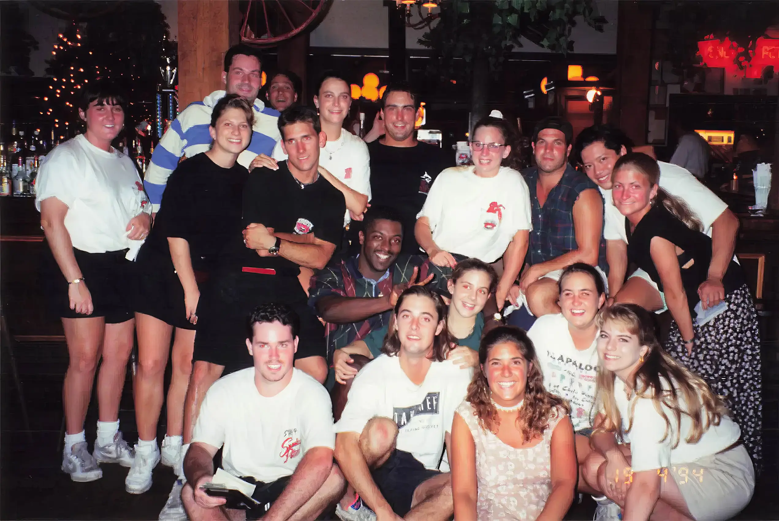 A large group of Hooper's Crab House staff gathered together inside the restaurant in 1994