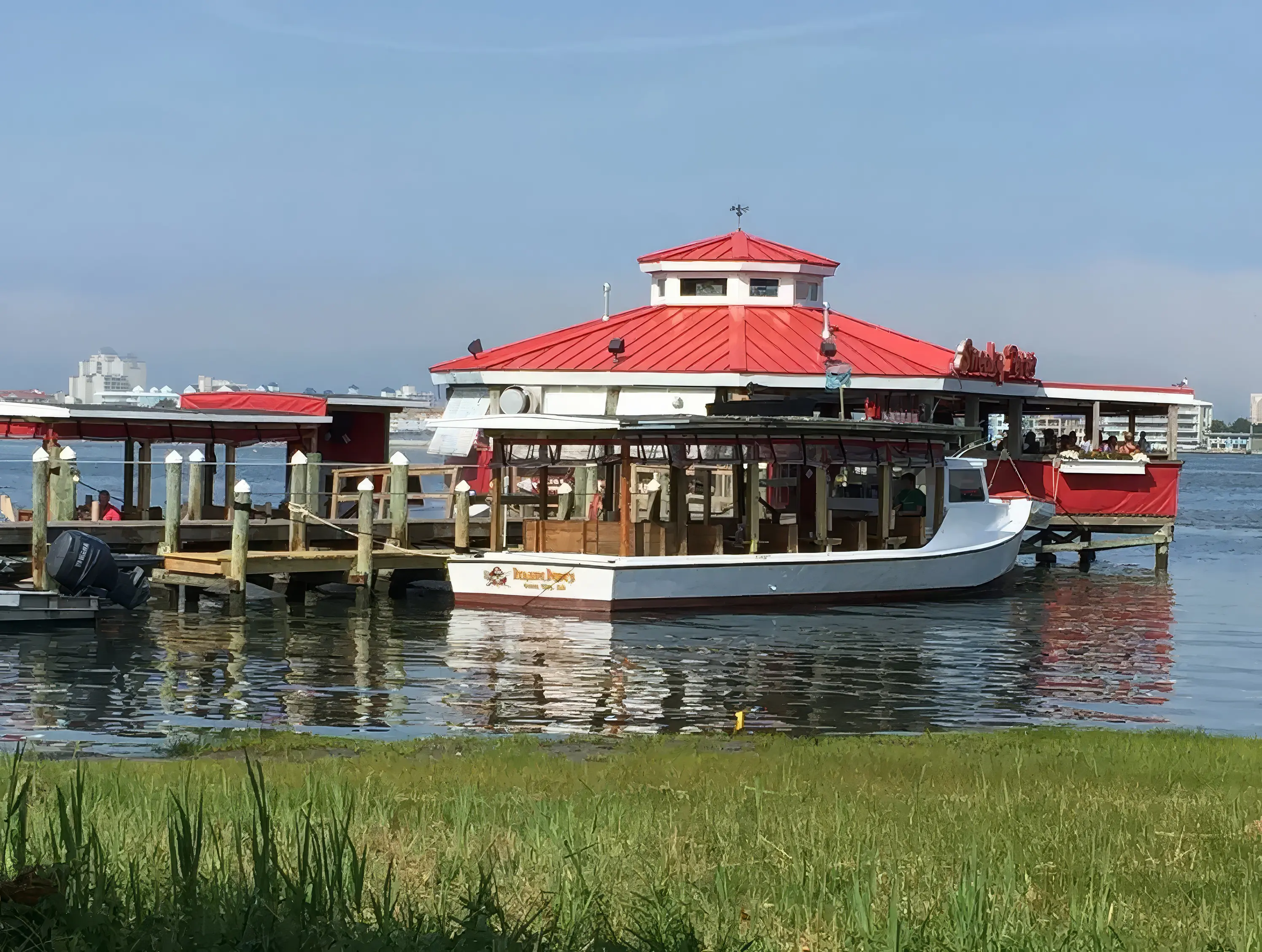 Sneaky Pete's waterfront bar and boat in Ocean City, Maryland