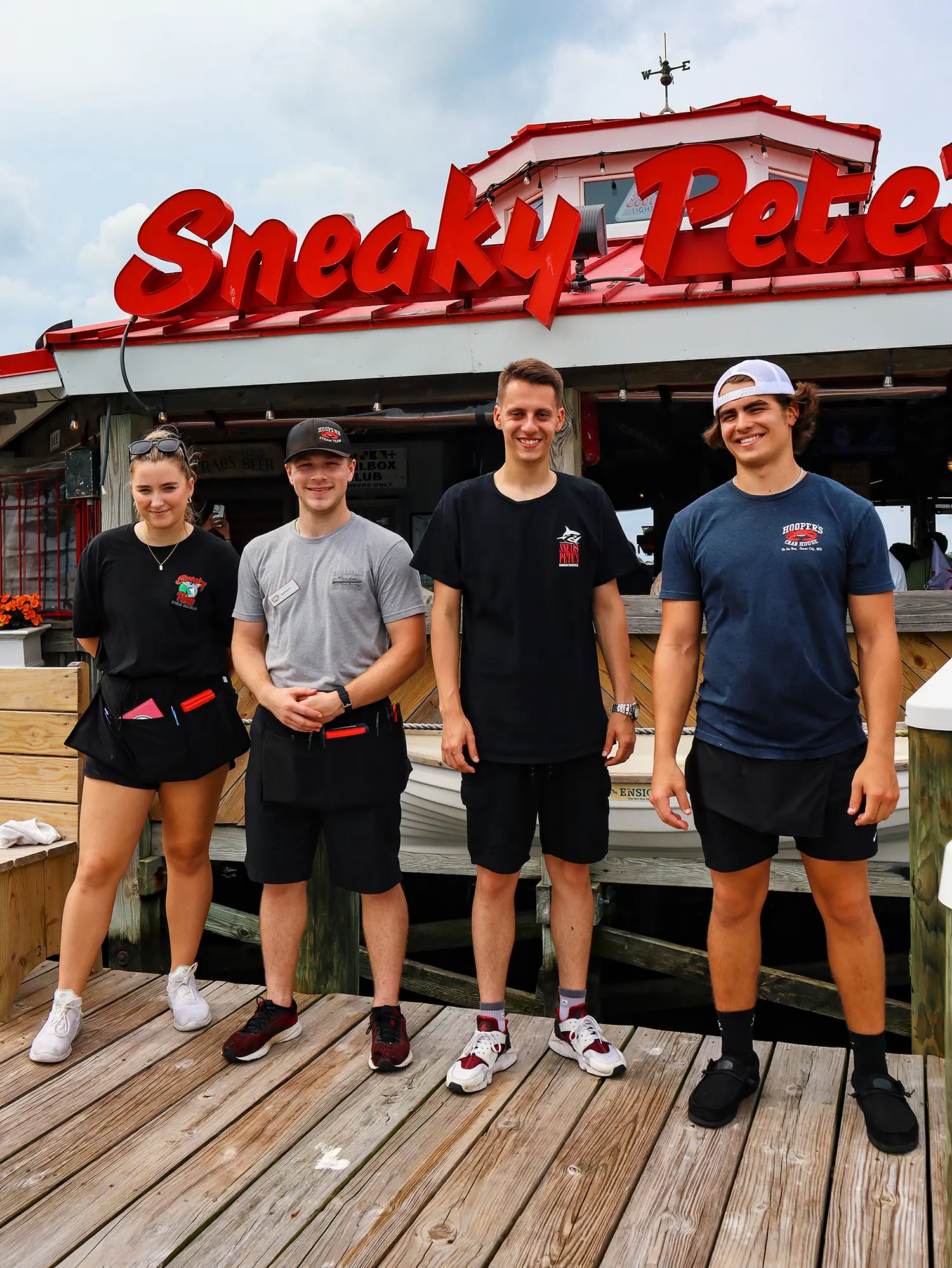 The Sneaky Pete's crew on the dock