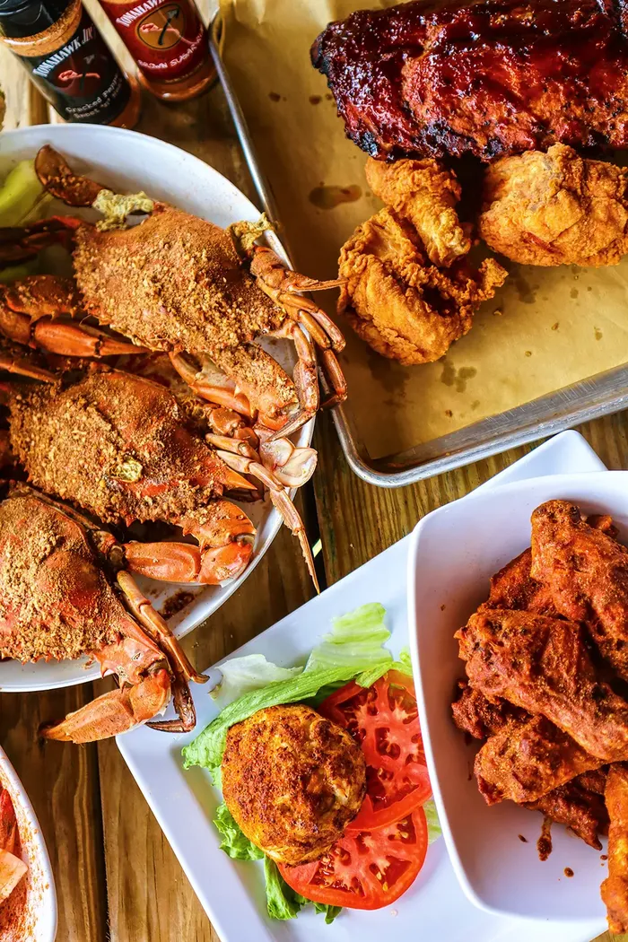 Steamed crabs, ribs, and fried chicken spread